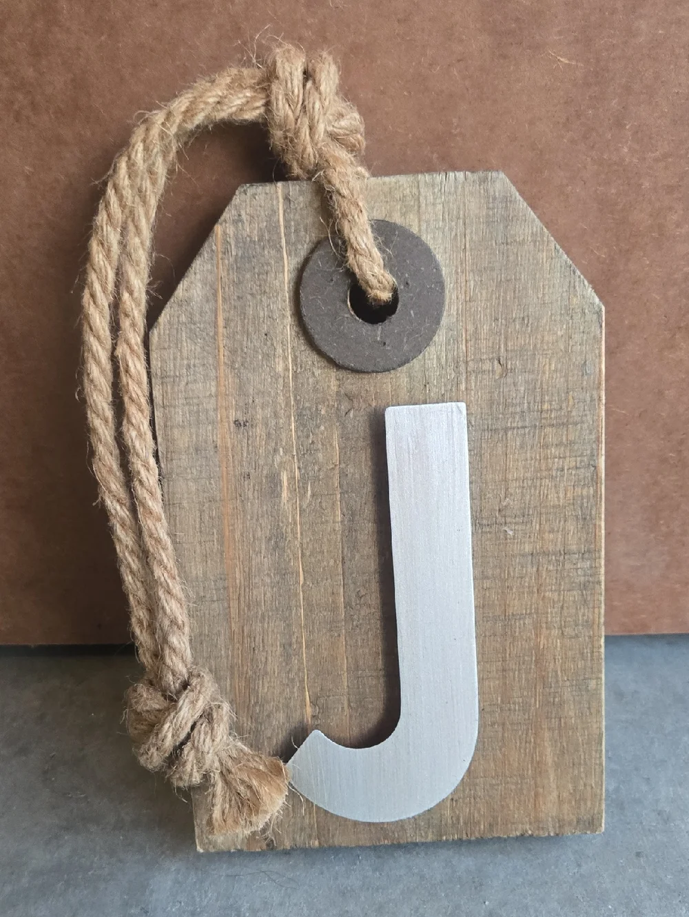 Rustic Wooden Wall Tag with White 'J' Accent
